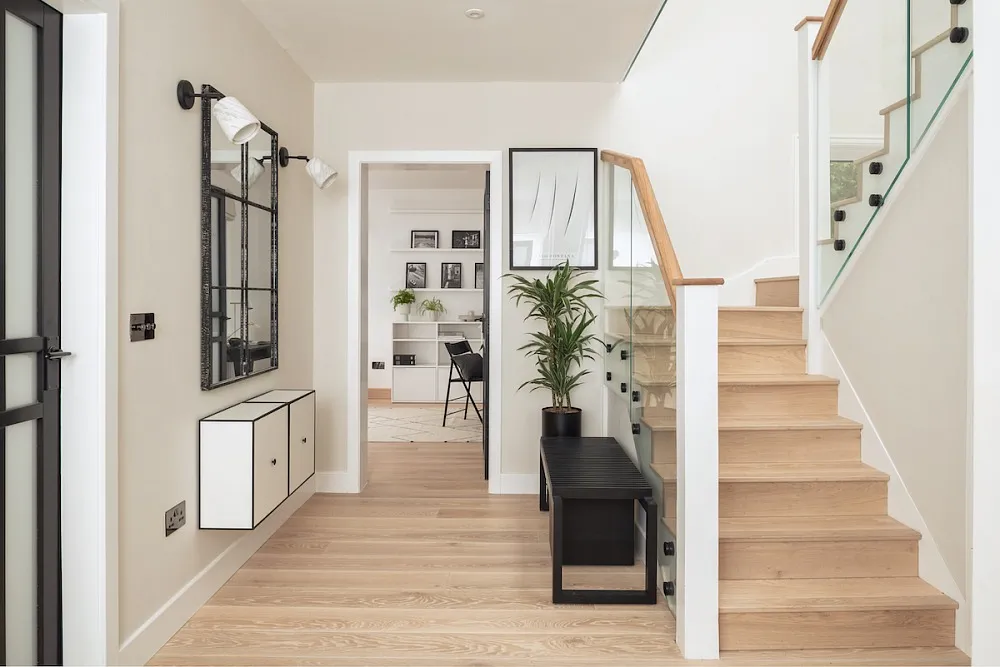 Modern Home Remodeling Entryway with Custom Staircase